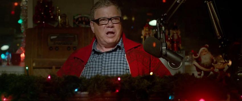 A Christmas Horror Story (1970) Movie scene: Dangerous Dan (William Shatner)  in his festive radio booth, broadcasting from Bailey Downs during Christmas Eve