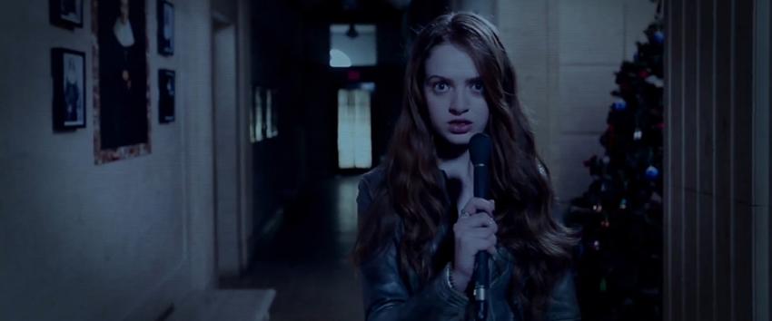 A Christmas Horror Story (1970) Movie scene: A teenage girl reporting from inside the haunted school's corridors