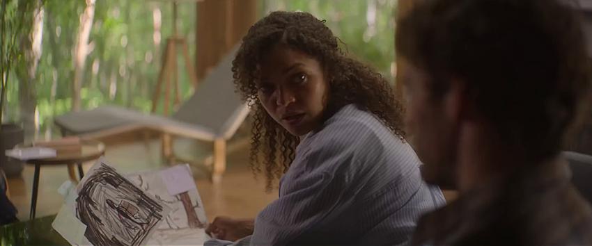 Bagman (1970) Movie scene: Karina (Antonia Thomas) and Patrick (Sam Claflin) looking at each other