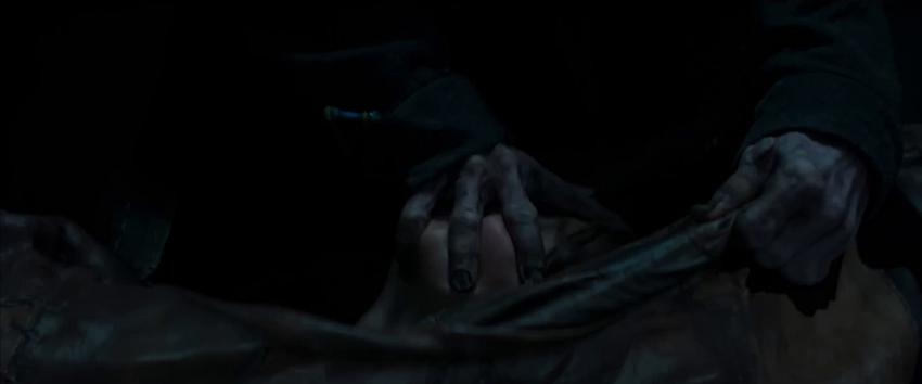 Bagman (1970) Movie scene: The Bagman stuffs what appears to be a victim into his bag