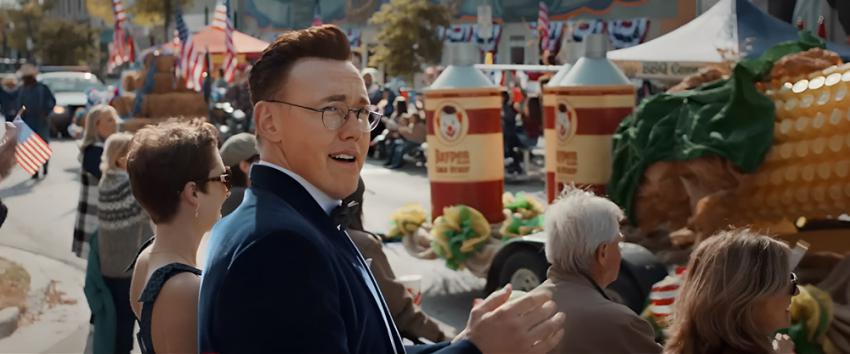 Clown in a Cornfield (1970) Movie scene: Mayor Arthur Hill (Kevin Durand) smiles proudly and applauds at the 100th annual Founders Day parade.
