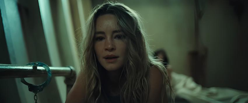 Dangerous Animals (1970) Movie scene: Zephyr (Hassie Harrison) held captive with a pair of handcuffs visible beside her