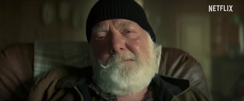 Don't Move (1970) Movie scene: Bill (Moray Treadwell) half-smirking while sitting in his recliner