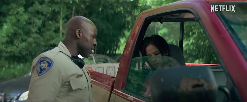 Don't Move (1970) Movie scene: State Trooper Dontrell (Daniel Francis) approaches a red truck with a slumped Iris (Kelsey Asbille) in the passenger seat