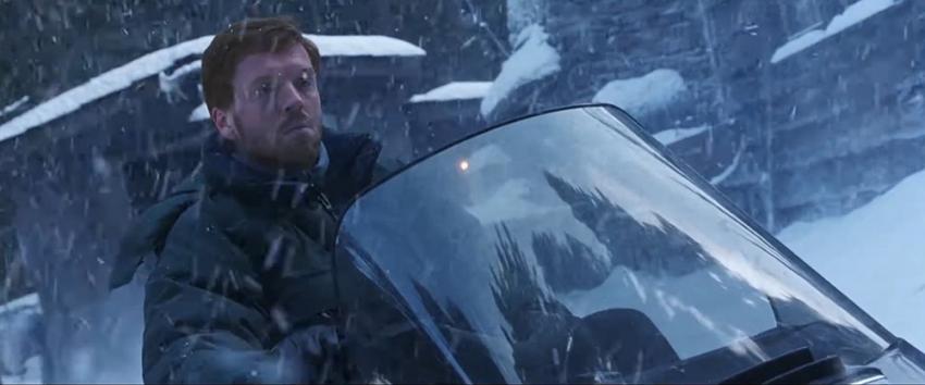 Dreamcatcher (1970) Movie scene: Jonesy (Damian Lewis) sitting on a snowmobile as it snows