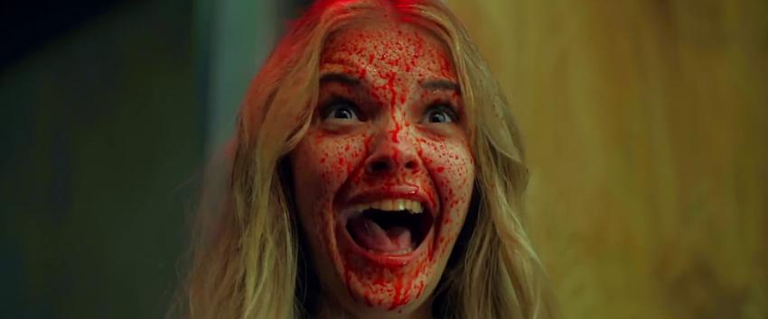 Elevator Game (1970) Movie scene: A blonde woman, covered in blood splatter, looking distraught