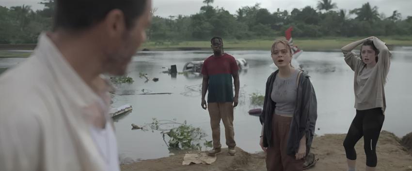 Gator Creek (1970) Movie scene: Frank (Andonis Anthony), Sam (Mohammed Mansaray), Kyle (Athena Strates), and Alice (Madalena Aragão) standing near the wreckage of their crashed plane in the swamp