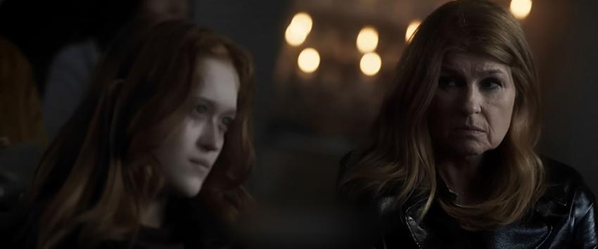 Here After (1970) Movie scene: Claire (Connie Britton) glances at Robin (Freya Hannan-Mills), who appears deep in thought