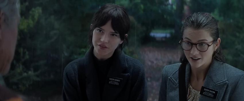 Heretic (1970) Movie scene: A close-up of Sister Barnes (Sophie Thatcher) and Sister Paxton (Chloe East), from the Church of Jesus Christ of Latter-day Saints