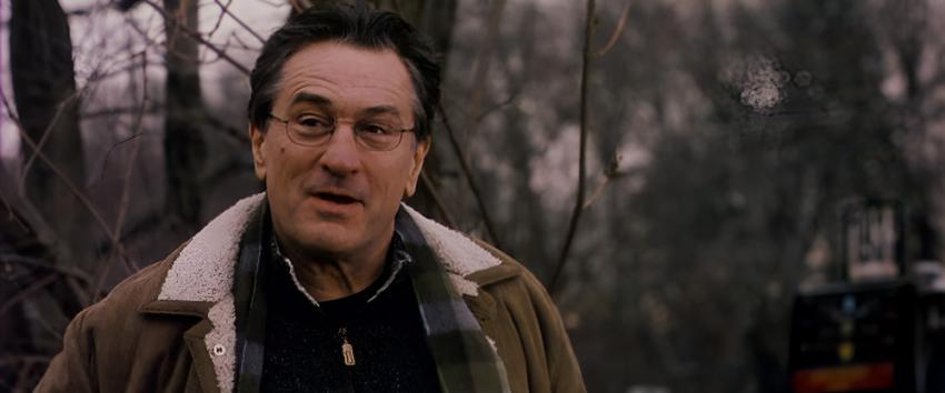 Hide and Seek (1970) Movie scene: David Callaway (Robert De Niro) standing against a backdrop of trees