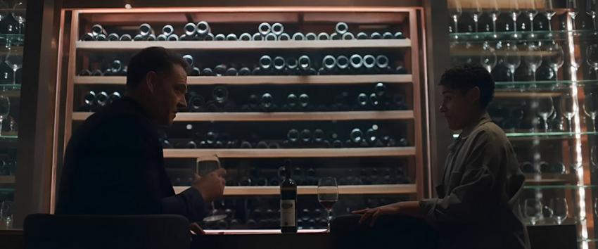 House of Spoils (1970) Movie scene: Marcello (Marton Csokas) and Chef (Ariana DeBose) sit at the bar, deep in conversation, as they discuss her future