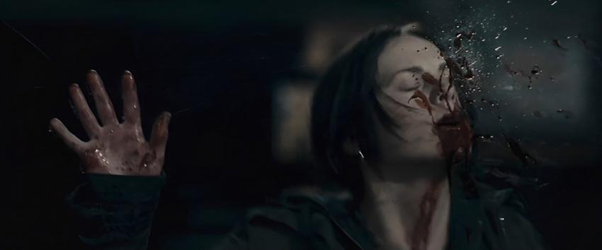 Pontypool (1970) Movie scene: Laurel (Georgina Reilly) presses her face against the glass booth, her face smeared with blood