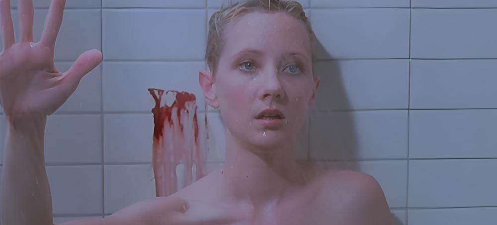 Anne Heche as Marion Crane in the shower after being stabbed in Psycho (1998)