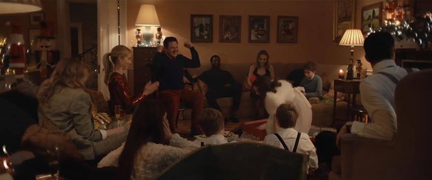 Silent Night (1970) Movie scene: Christmas celebration underway in the living room as the group plays charades