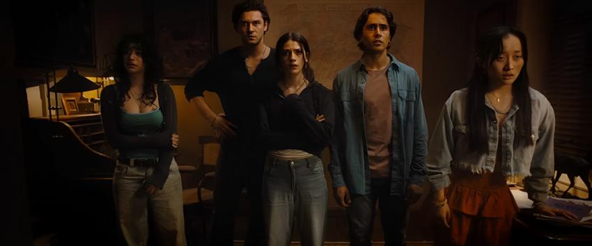 Until Dawn (1970) Movie scene: Clover and her friends standing together, staring straight ahead.