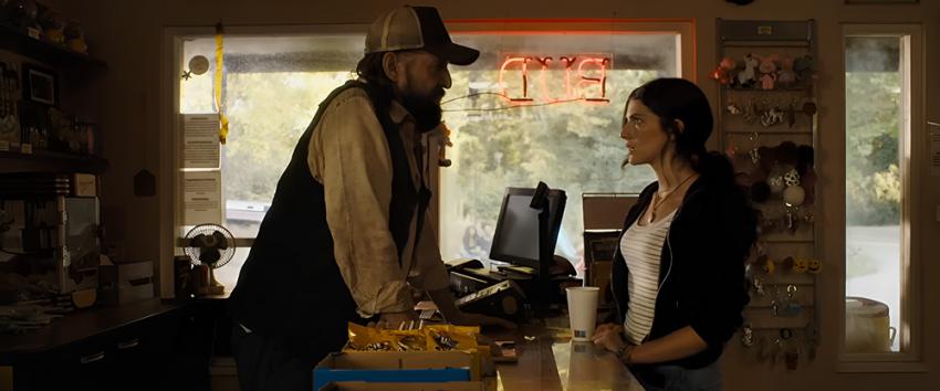 Until Dawn (1970) Movie scene: Gas station attendant Dr. Hill (Peter Stormare) talking with Clover (Ella Rubin) at Hartley’s Gas Station.