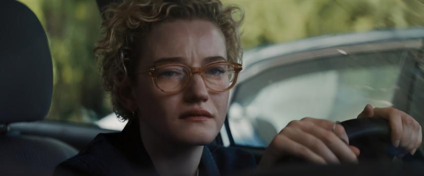 Weapons (1970) Movie scene: Justine (Julia Garner), visibly upset in a parked car